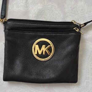 Michael Kors Black Wristlet with Gold Logo